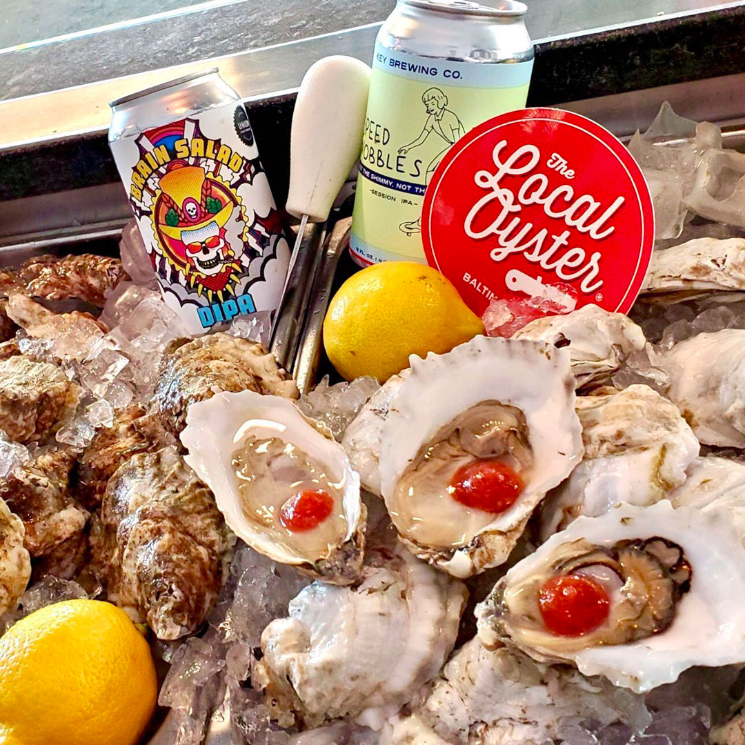 Oysters and beer one ice from Locay Oyster in Mt. Vernon Marketplace.