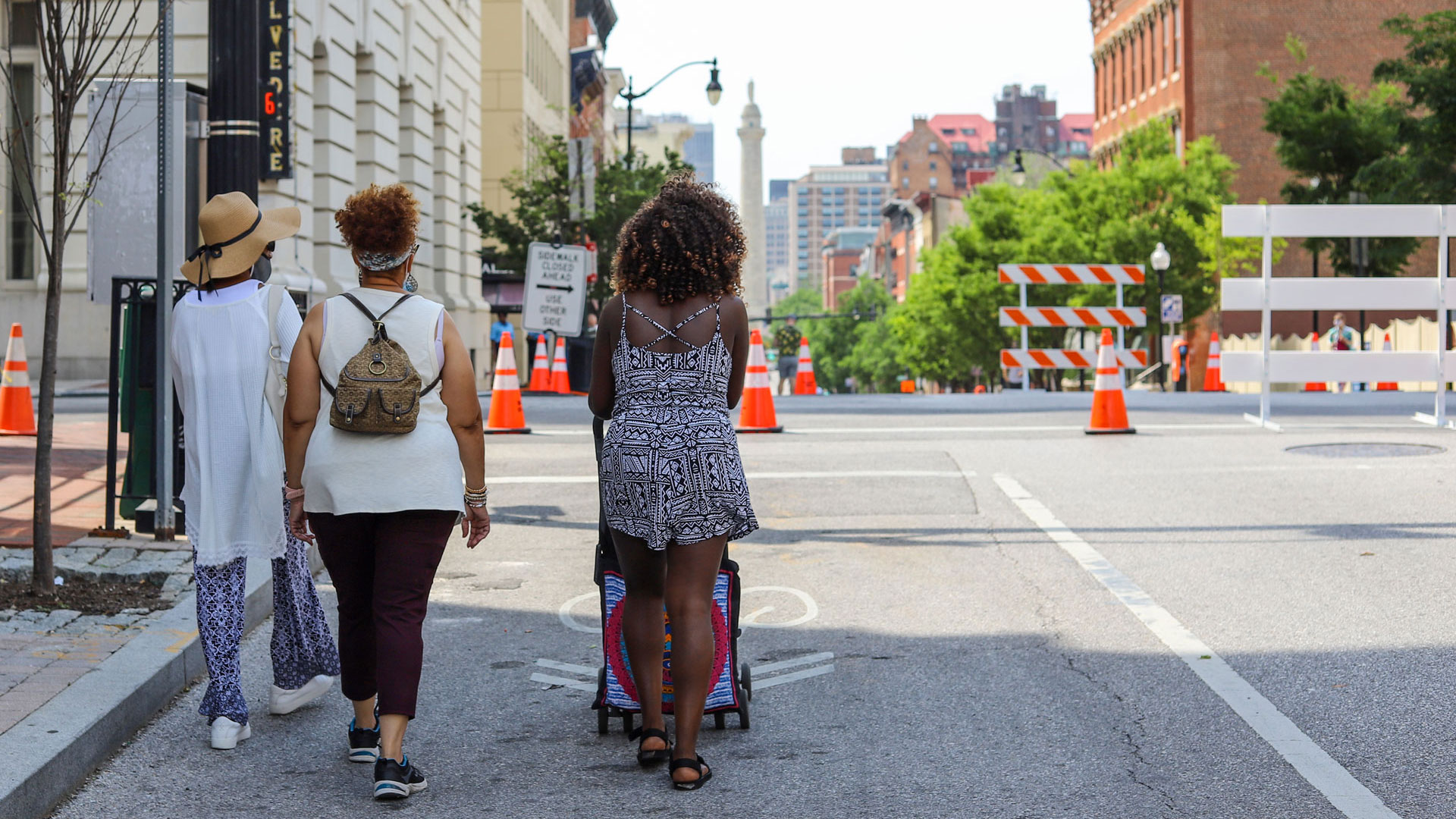 Women strolling along Charles Street for Charles Street Promenade